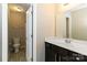 Well-lit bathroom with a single sink and modern vanity, and a separate toilet room at 217 Hydrangea Dr, Clover, SC 29710