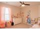 This bedroom has a large window and playful décor at 217 Hydrangea Dr, Clover, SC 29710