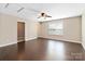 Spacious bedroom features hardwood floors, ceiling fan, and plenty of natural light at 217 Hydrangea Dr, Clover, SC 29710