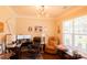 Comfortable home office featuring a large window, a neutral paint scheme and multiple seating options at 217 Hydrangea Dr, Clover, SC 29710