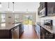Modern kitchen with stainless steel appliances and granite countertops at 217 Hydrangea Dr, Clover, SC 29710