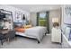 Nicely decorated bedroom that includes artwork, shelves, and a window view at 2635 Tillman St, Monroe, NC 28112