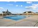 Large community pool with sun deck, clubhouse, and covered pavilion at 2635 Tillman St, Monroe, NC 28112