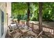 Virtually staged deck with outdoor seating, a charming space for relaxing and enjoying the backyard view at 2729 S Ridge Ave, Concord, NC 28025
