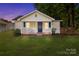 Charming single-story home featuring a welcoming front porch, lush lawn, and well-maintained landscaping at 2729 S Ridge Ave, Concord, NC 28025