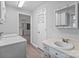 Laundry room includes washer and dryer along with overhead cabinets and a sink at 2729 S Ridge Ave, Concord, NC 28025
