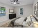 Calm main bedroom with neutral tones, features an inviting bed, dresser, and comforting decor at 2729 S Ridge Ave, Concord, NC 28025