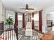 Cozy Bedroom featuring a comfortable chair, crib, and a patterned area rug at 2816 Eastport Rd, Charlotte, NC 28205