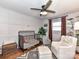 Bedroom with hardwood floors, a modern ceiling fan and a crib with a plush rug at 2816 Eastport Rd, Charlotte, NC 28205