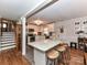 Bright kitchen with white cabinets, a granite island, and modern stainless steel appliances at 2816 Eastport Rd, Charlotte, NC 28205