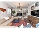 Cozy living room showcases a white brick fireplace, area rug, and comfortable seating at 2816 Eastport Rd, Charlotte, NC 28205