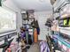 Organized storage area featuring shelving units, bins, and various household items at 2816 Eastport Rd, Charlotte, NC 28205