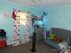 Charming bedroom with blue walls and a playful window curtain at 2826 Drew Dr, Lancaster, SC 29720