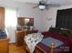 This bedroom boasts of a wooden dresser and a mirror at 2826 Drew Dr, Lancaster, SC 29720