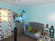 Charming bedroom featuring playful decor, a cozy bed, and ample storage at 2826 Drew Dr, Lancaster, SC 29720