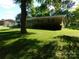 Cozy, single-Gathering home featuring a lush green lawn and mature trees providing ample shade at 2826 Drew Dr, Lancaster, SC 29720