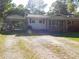 A one-story home with carport and a partially shaded front yard at 2826 Drew Dr, Lancaster, SC 29720