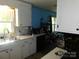 Functional kitchen with white cabinets, stainless steel sink, and ample counter space at 2826 Drew Dr, Lancaster, SC 29720
