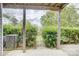 Outdoor space offers privacy with lush green bushes at 2916 Iron Gate Ln, Charlotte, NC 28212