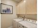Laundry room with upper cabinets and a side-by-side washer and dryer at 3002 Portico Pl, Tega Cay, SC 29708