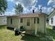 Home exterior with a small yard and a functional back entrance at 315 Broad Sw Dr, Concord, NC 28025