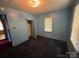 Small, simple bedroom with one closet and two windows for ample light at 315 Broad Sw Dr, Concord, NC 28025