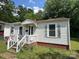 Charming single-story home with a cozy porch and well-maintained yard in a quiet neighborhood at 315 Broad Sw Dr, Concord, NC 28025