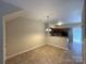 Inviting dining area adjacent to kitchen with a stylish pendant light fixture at 3527 Creeping Flora Ln, Charlotte, NC 28216