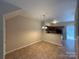 Bright dining area featuring tiled flooring, pendant lighting, and easy access to the kitchen and outdoor patio at 3527 Creeping Flora Ln, Charlotte, NC 28216