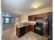 Bright kitchen area offering great light with access to adjacent rooms at 3527 Creeping Flora Ln, Charlotte, NC 28216