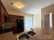 Fully-equipped kitchen with tile floors, providing plenty of counter space and storage, adjacent to a bright breakfast area at 3527 Creeping Flora Ln, Charlotte, NC 28216
