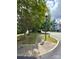 A street view, with mature trees lining the sidewalk at 3527 Creeping Flora Ln, Charlotte, NC 28216
