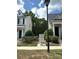 Well-maintained townhomes with charming curb appeal and manicured landscaping at 3527 Creeping Flora Ln, Charlotte, NC 28216