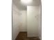A walk-in closet featuring white walls, carpet, and white wire shelving along three walls for storage at 3527 Creeping Flora Ln, Charlotte, NC 28216