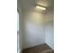 Bright walk-in closet offering ample storage space with carpet floors and a built-in shelf at 3527 Creeping Flora Ln, Charlotte, NC 28216