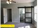 Bedroom with en-suite bathroom, sliding barn door, and walk-in closet at 404 N Peterson St, Stanley, NC 28164