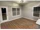 Cozy dining area with abundant natural light and deck access at 404 N Peterson St, Stanley, NC 28164