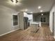 New kitchen features stainless steel appliances and white cabinets at 404 N Peterson St, Stanley, NC 28164