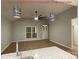 Spacious living room with updated ceiling fan and modern lighting at 404 N Peterson St, Stanley, NC 28164