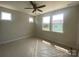 Bedroom with ample natural light from the windows, with a ceiling fan at 408 Nathaniel Way # Brx0053, Charlotte, NC 28213