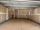 Spacious garage with ample ceiling height; perfect for storage and vehicles at 408 Nathaniel Way # Brx0053, Charlotte, NC 28213