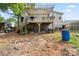 Backyard featuring a deck with pergola, steps, and storage space below at 430 Edgegreen Dr, Charlotte, NC 28217