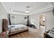Comfortable main bedroom features trey ceiling, recessed lighting, and an ensuite bathroom at 430 Edgegreen Dr, Charlotte, NC 28217