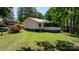 Exterior view of the lake house with screened porch and carport at 4599 B & C Dr, Catawba, NC 28609