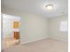 Bedroom with neutral carpet, and a doorway leading to the kitchen and other rooms at 505 2Nd Street Ne Pl # B2, Conover, NC 28613