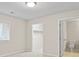 Bright bedroom with walk-in closet and ensuite bathroom, featuring neutral carpet at 505 2Nd Street Ne Pl # B2, Conover, NC 28613