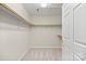 Walk-in closet featuring carpet and adjustable shelves and hanging rods at 505 2Nd Street Ne Pl # B2, Conover, NC 28613