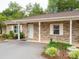 Charming brick home featuring a covered porch and well-maintained landscaping at 505 2Nd Street Ne Pl # B2, Conover, NC 28613