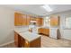 Bright kitchen with ample counter space, wood cabinets, and modern appliances at 505 2Nd Street Ne Pl # B2, Conover, NC 28613