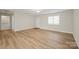 Open living room features modern floors, neutral walls, and ample space for relaxation at 505 2Nd Street Ne Pl # B2, Conover, NC 28613